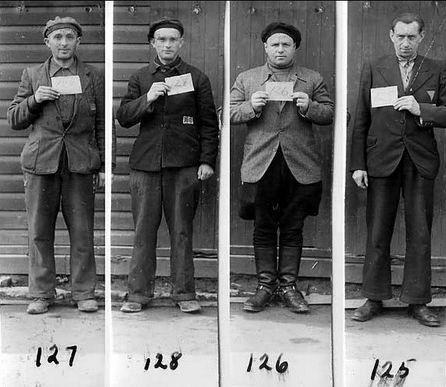 在解放布痕瓦尔德集中营后，美国军队为4位曾经的被关押者拍摄了照片，希望他们能够以证人身份出现在法庭上。